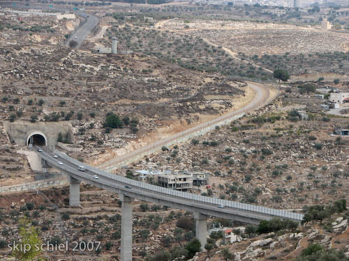 Annexation Fence crosses under the Israeli only road between settlements and Jerusalem